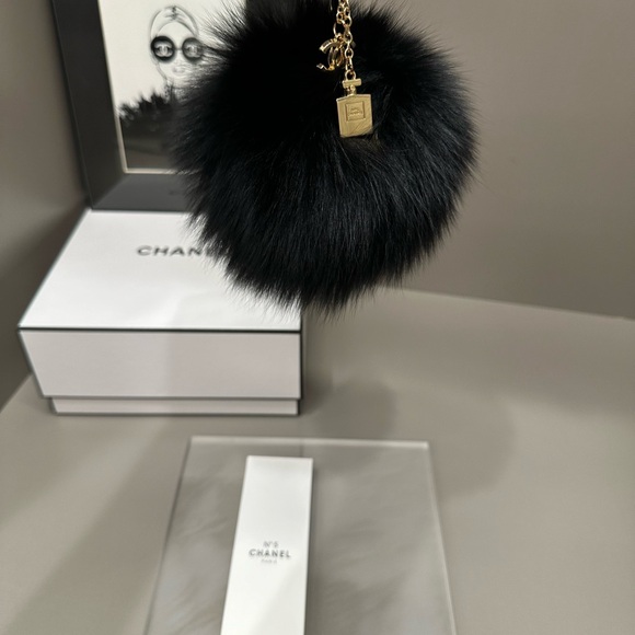 CHANEL Handbags - Chanel Authentic Beauty key chain/bag charm with an added real fox fur poof!